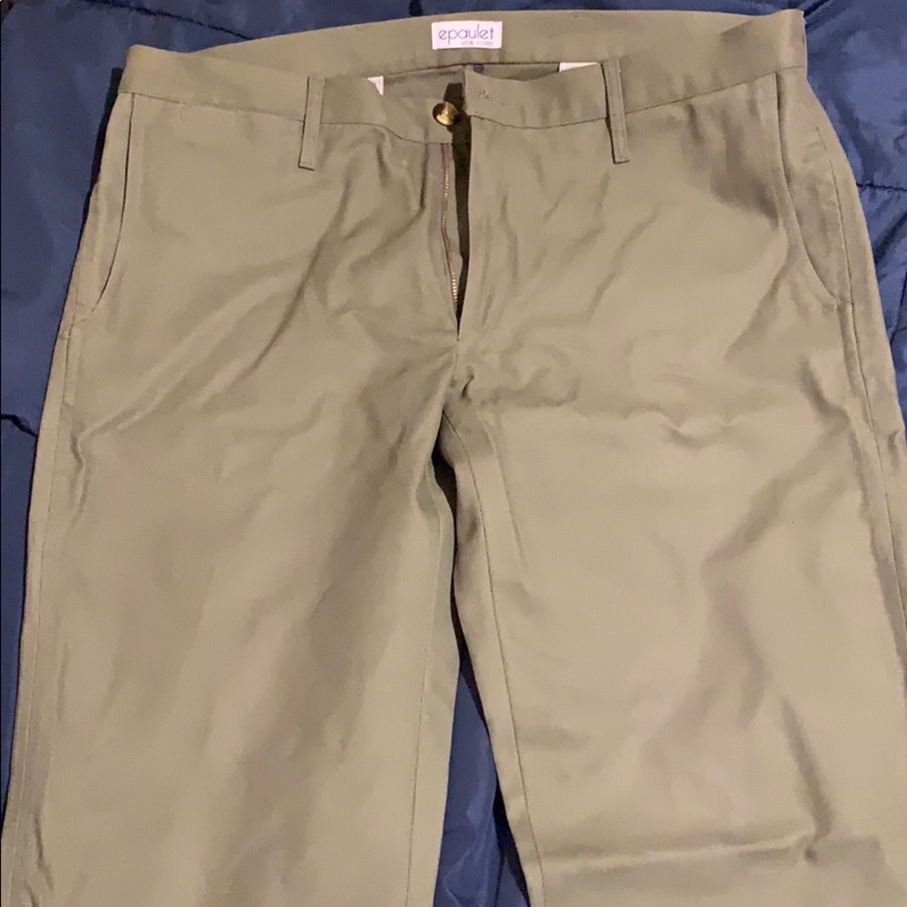 Men’s epaulet New York dress slacks.